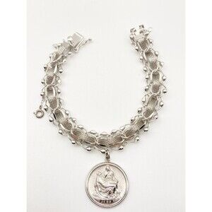 Super heavy vintage sterling silver religious charm bracelet